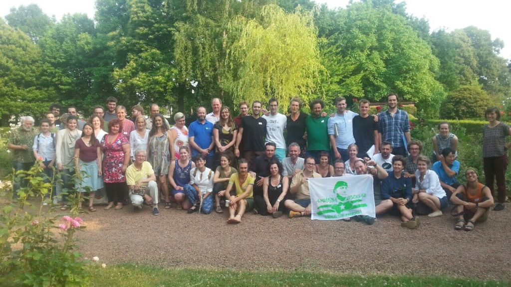 A group of Access to land EU "ambassadors" at Notre Dame Chant d'Oiseau during June heatwave at 